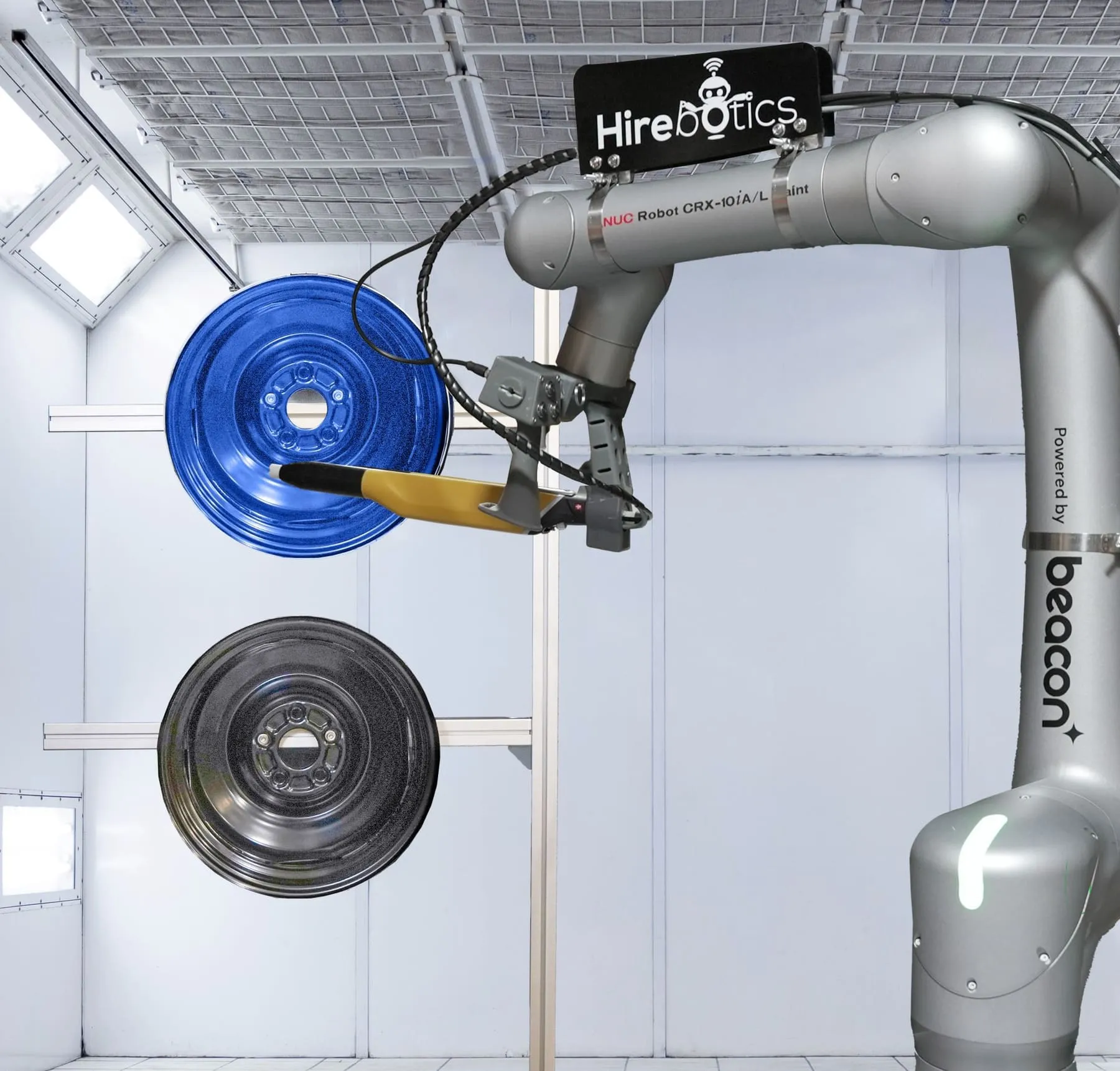 Cobot Painter applying an even coat inside a spray booth